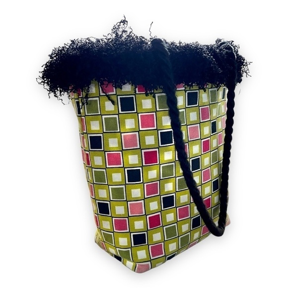 SMALL, REVERSIBLE, CANVAS PURSE. MEASURES AT BASE, 7”W X 4”D X 10”H. NO BRAND. - Picture 7 of 7